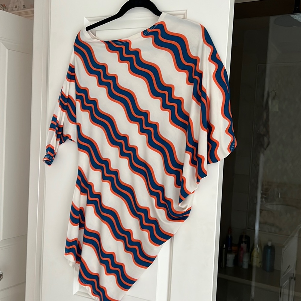 Asymmetrical swimsuit cover up. Geometric cream, orange and blue stripes